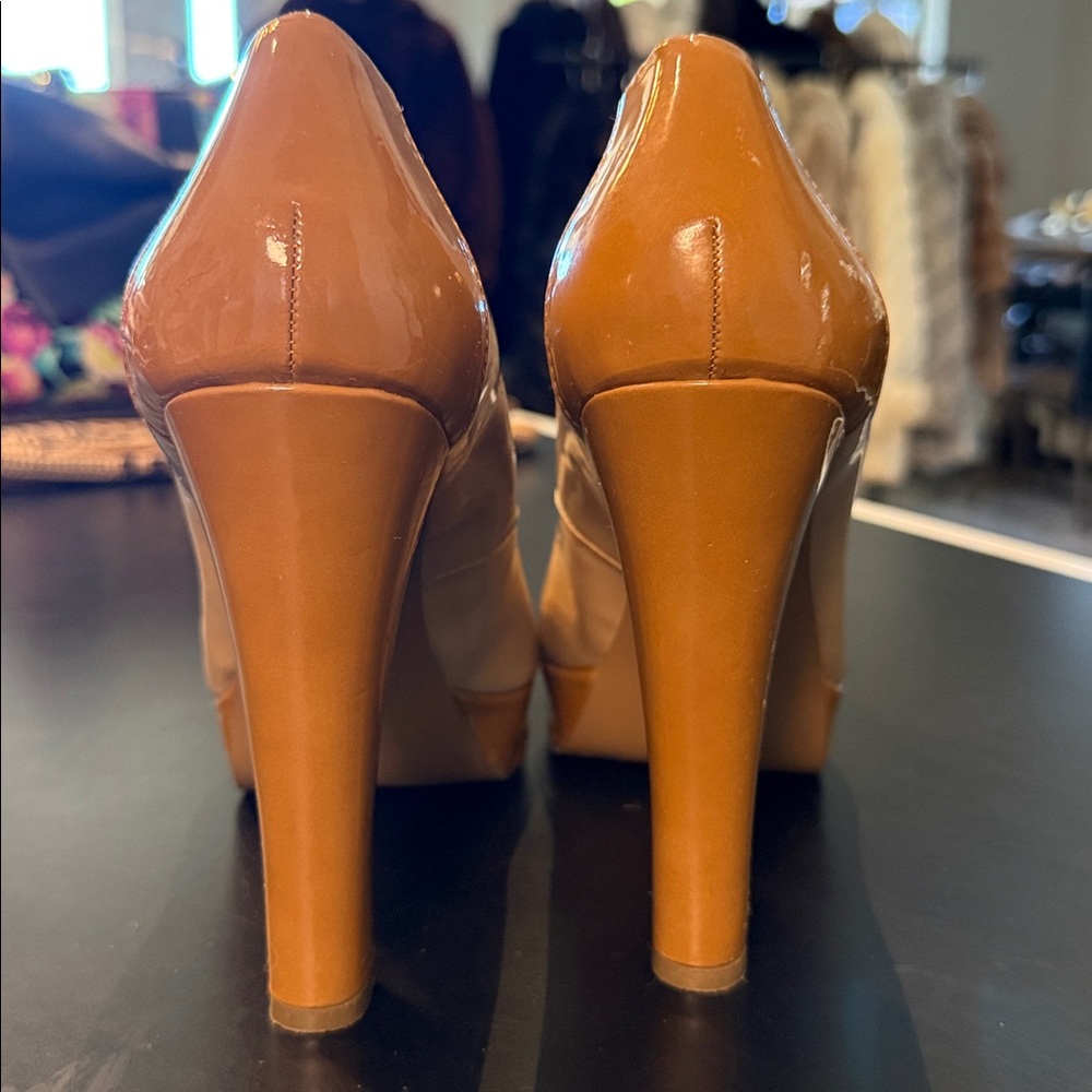 BCBG Paris Nude Patent Leather Platform Pumps
Size 6.5 - Picture 6 of 10